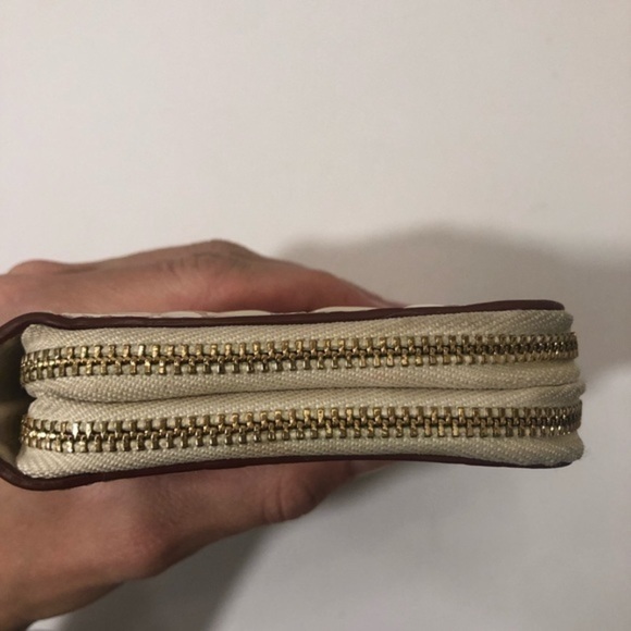 Coach debossed creamy white double zipper wristlet